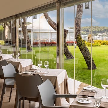 a restaurant with tables and chairs