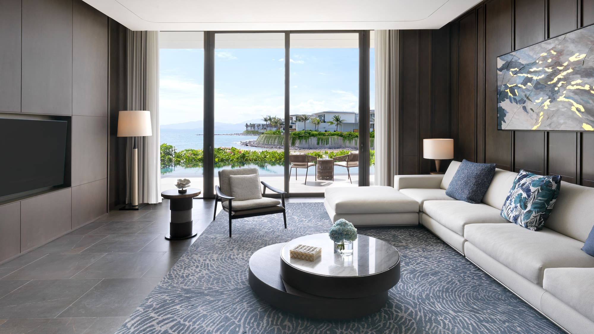 a living room with a large glass door