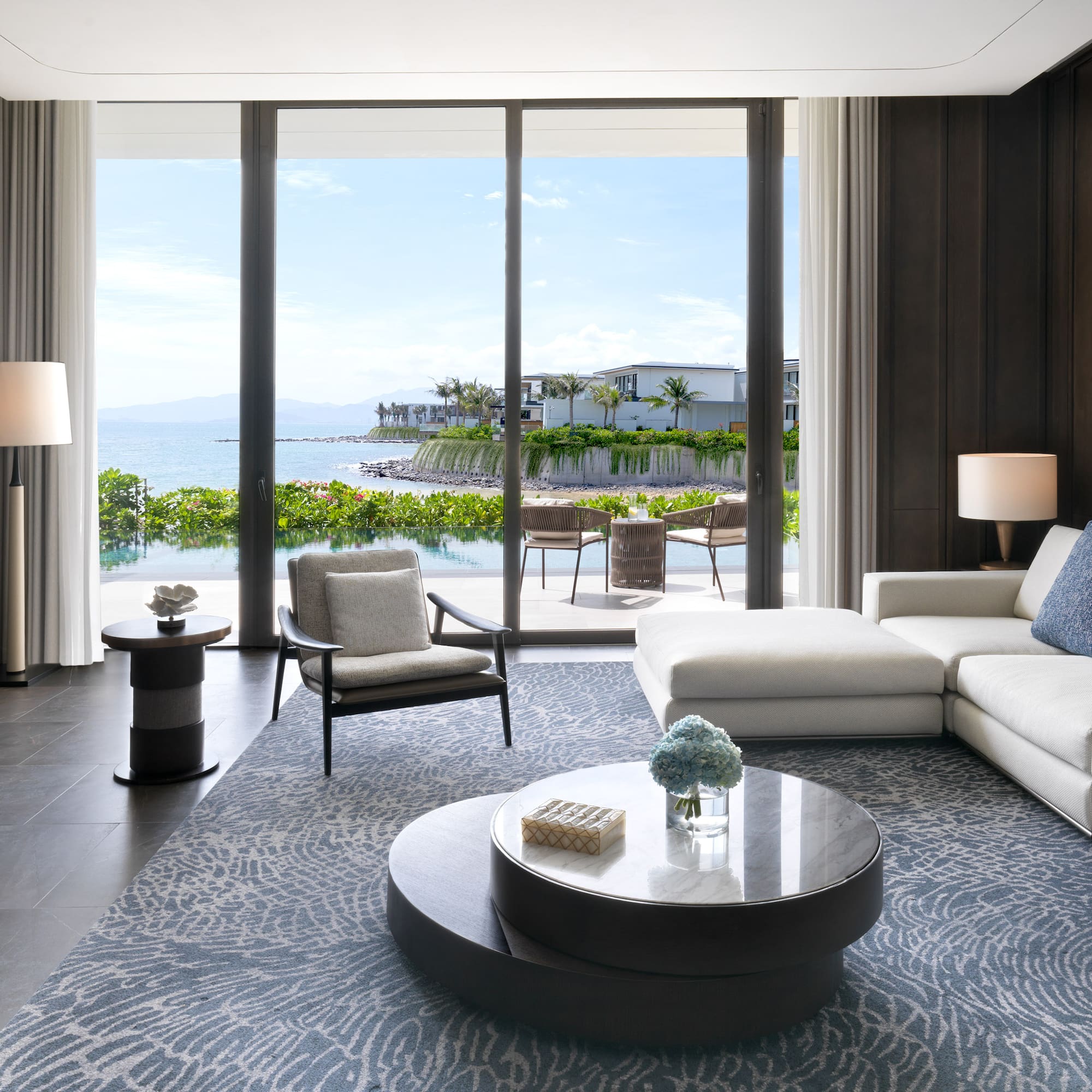 a living room with a large glass door