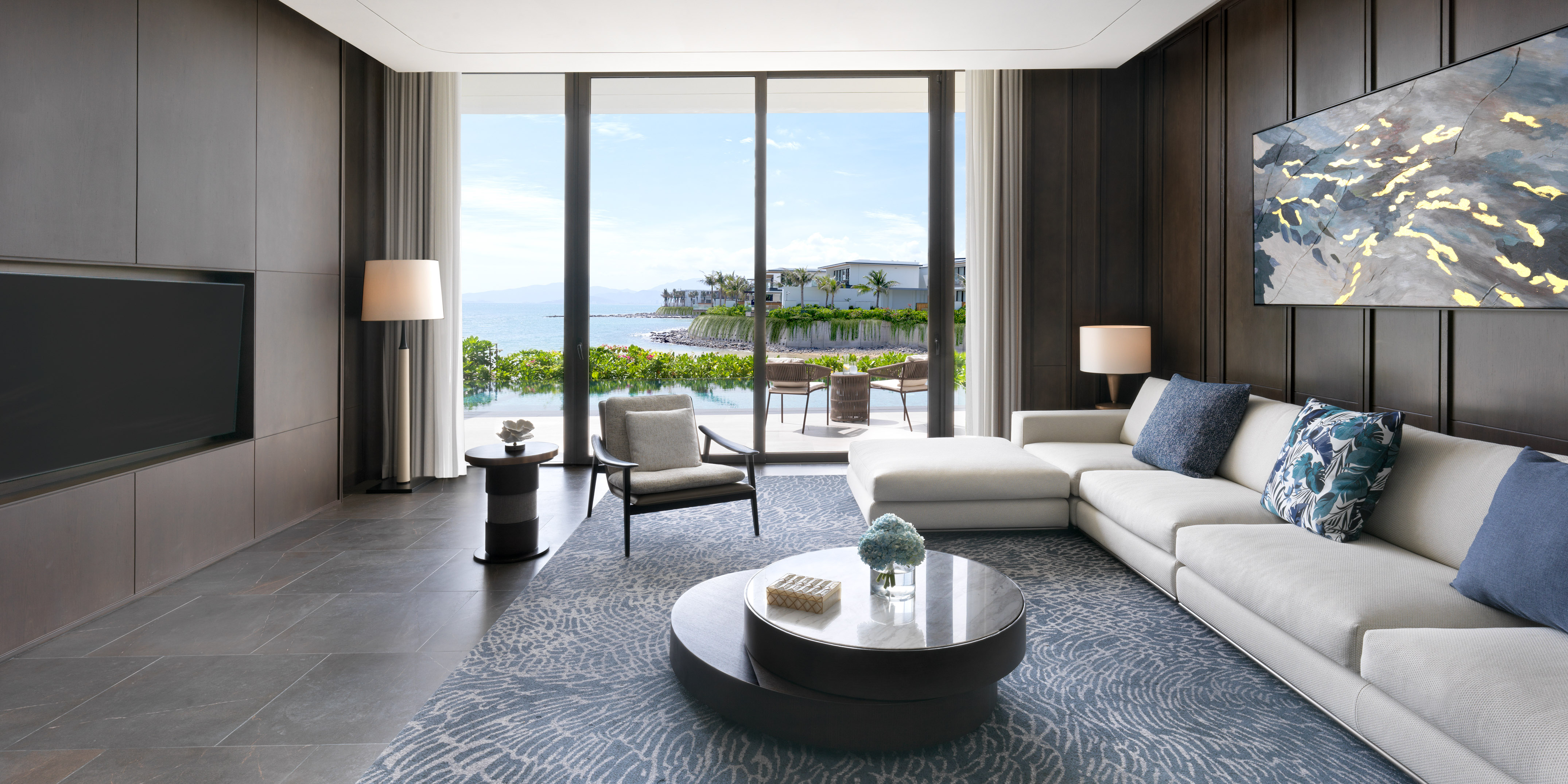 a living room with a large glass door