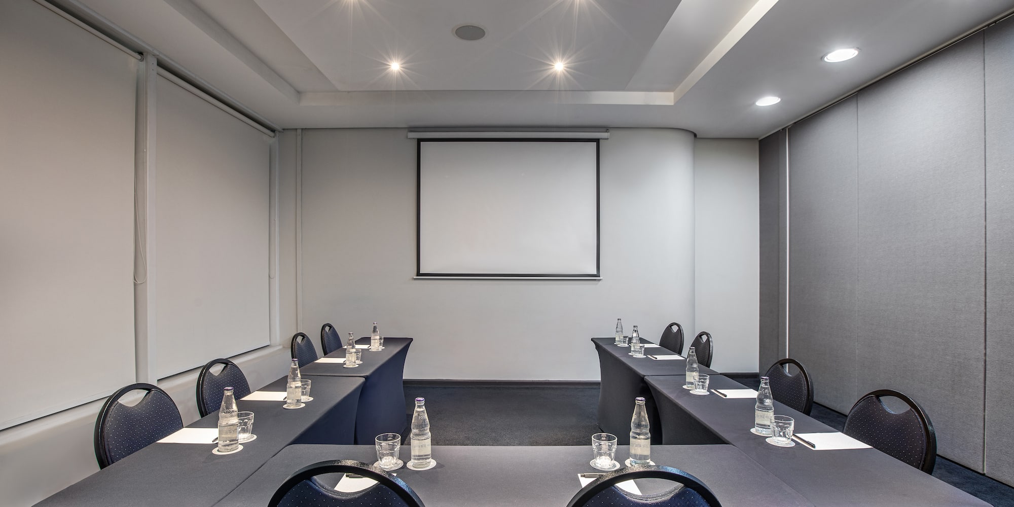 a room with tables and chairs