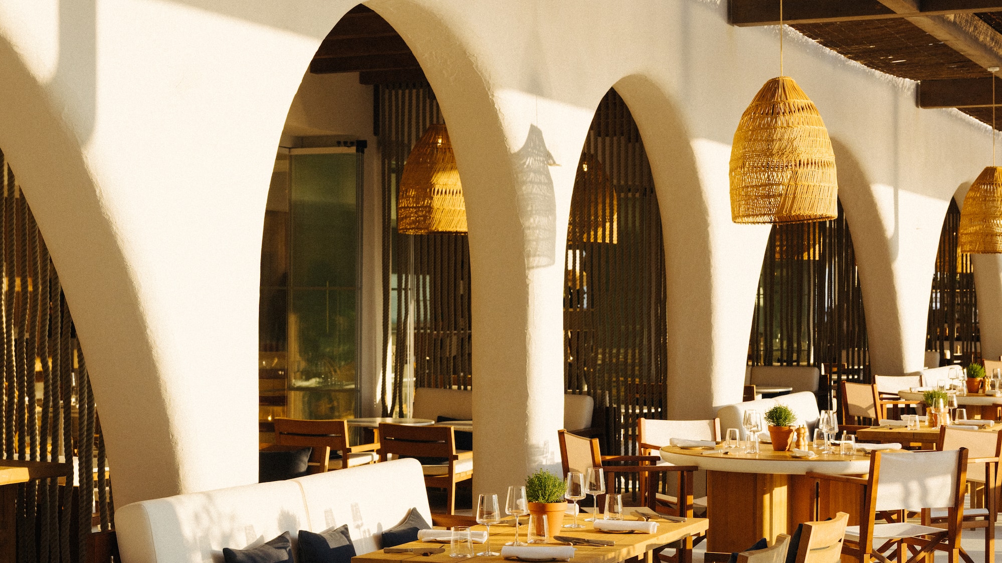 a restaurant with tables and chairs