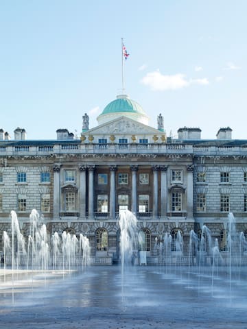 a fountain in front of a building