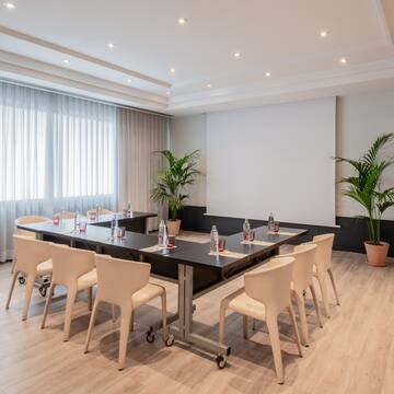 a room with a table and chairs