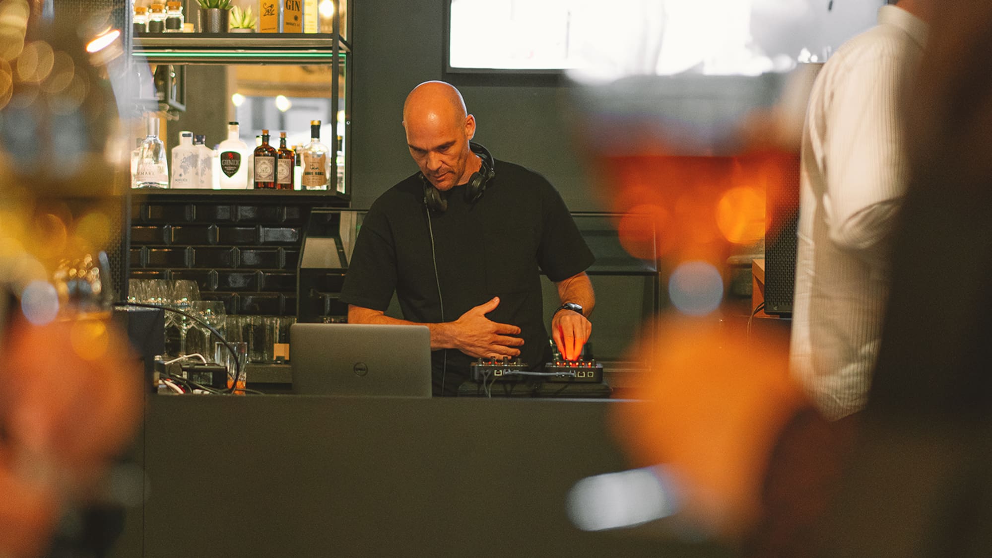a man standing behind a counter