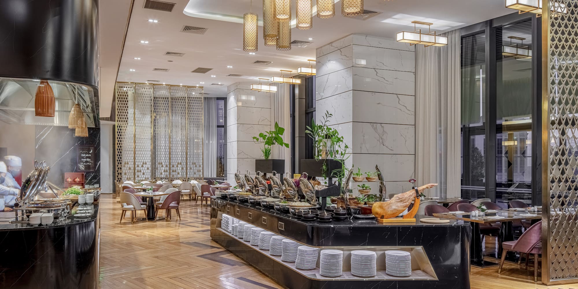 a restaurant with a large counter and tables