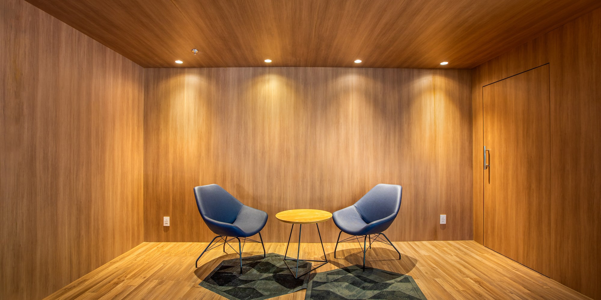 a room with chairs and a table