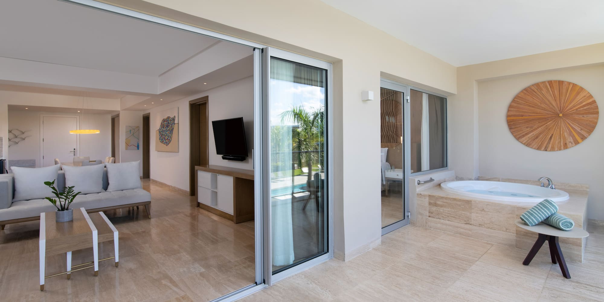 a room with a jacuzzi and a television