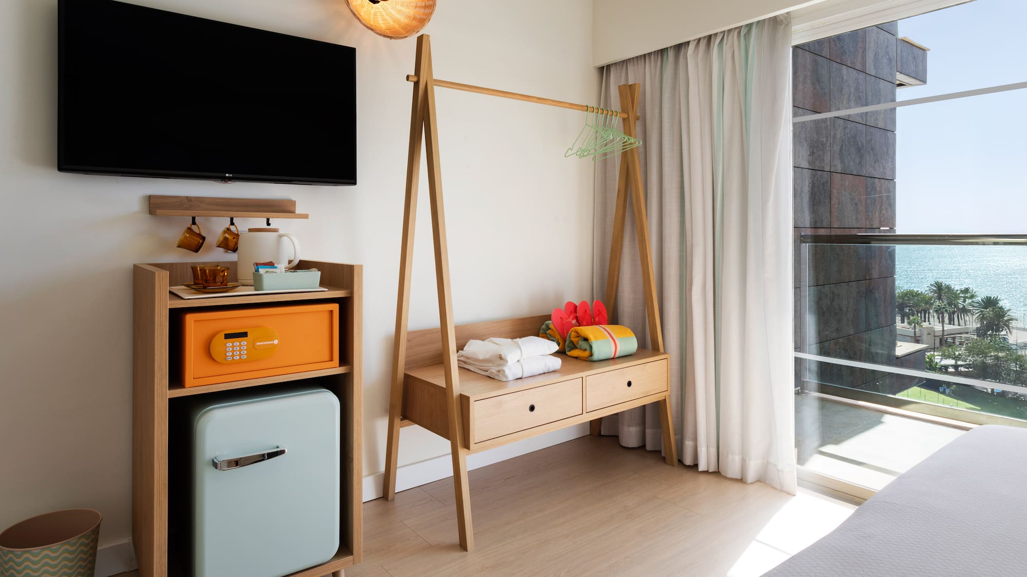 a room with a television and a shelf