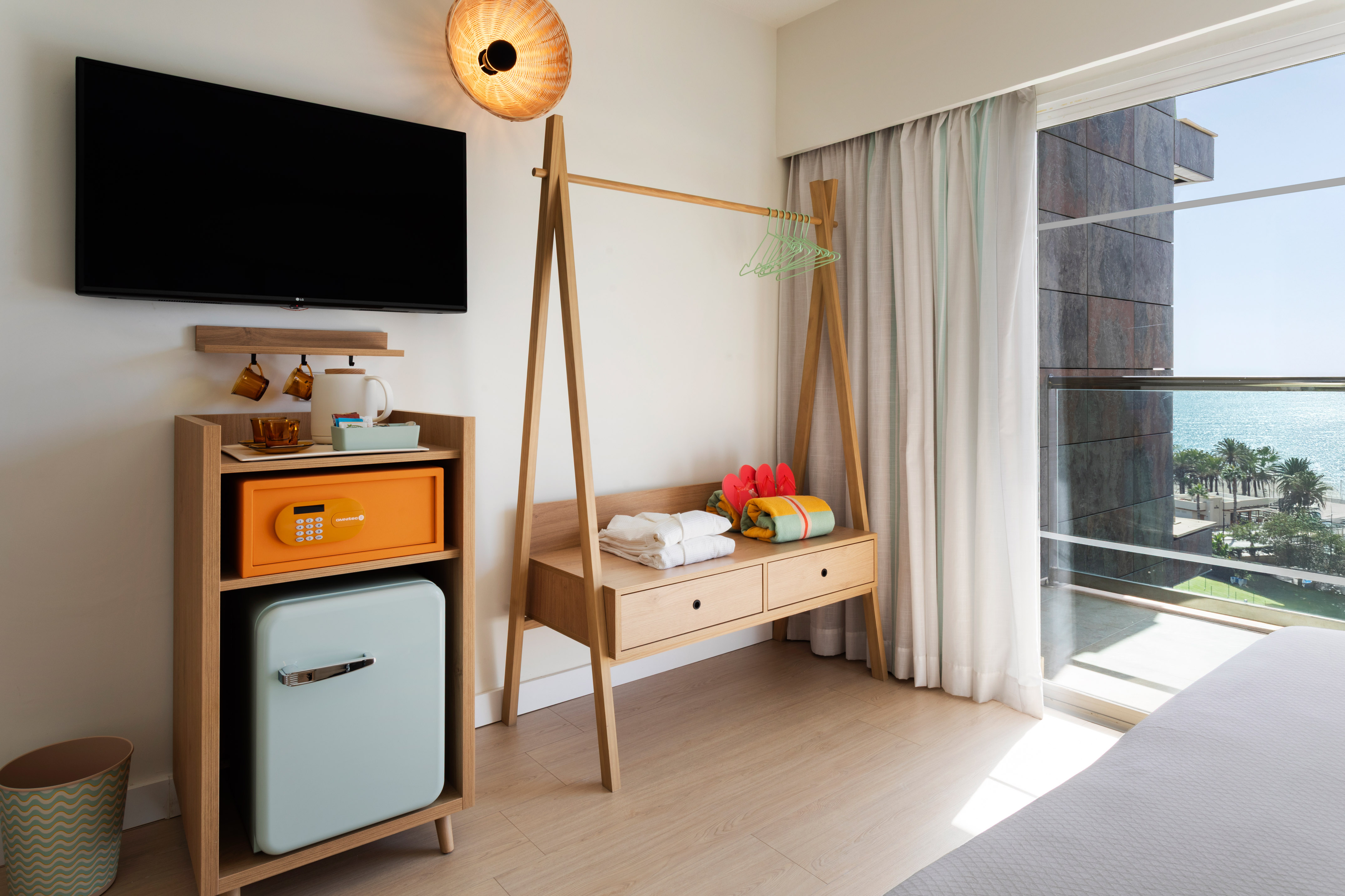 a room with a television and a shelf