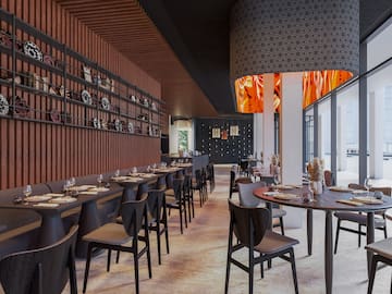 a restaurant with tables and chairs