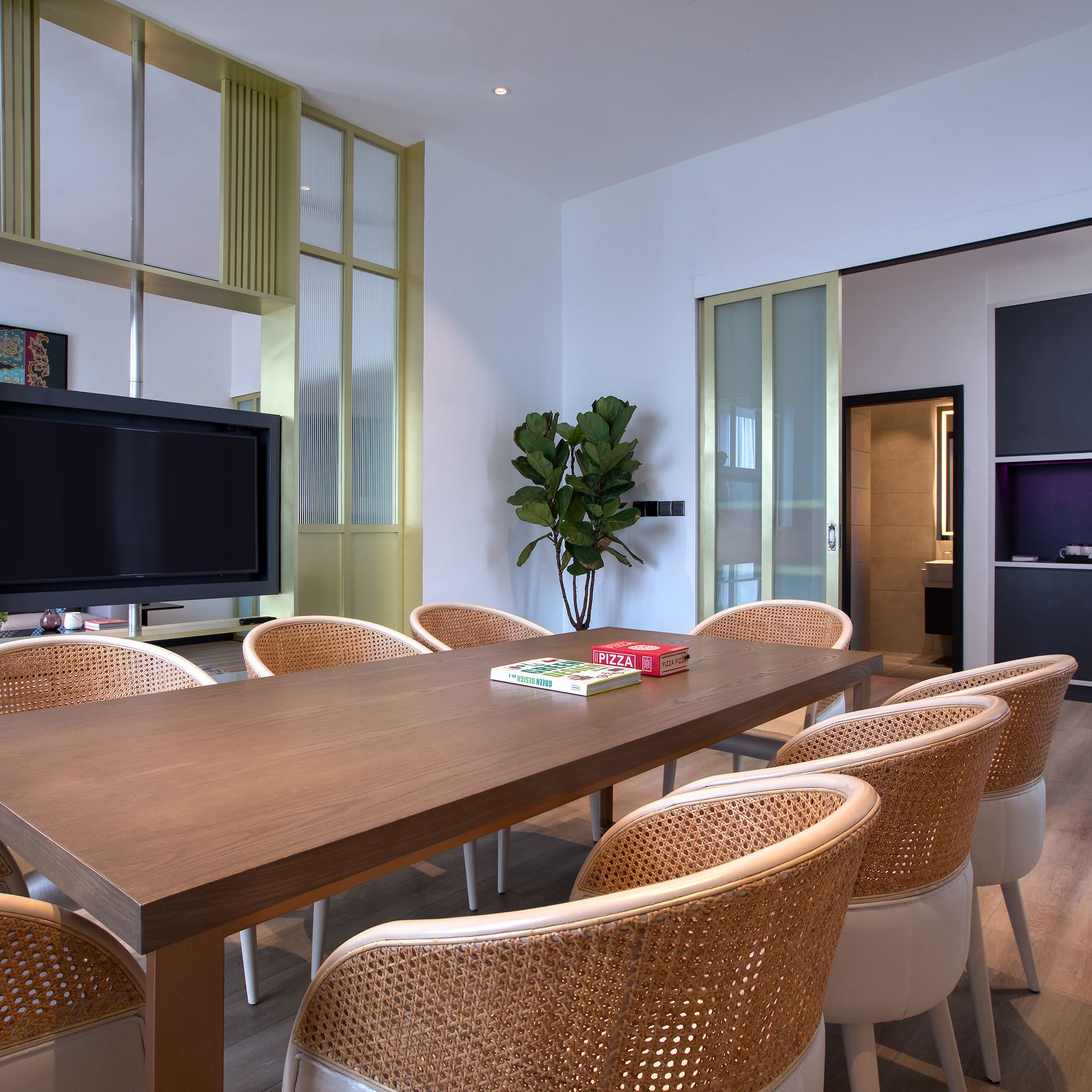 a room with a table and chairs