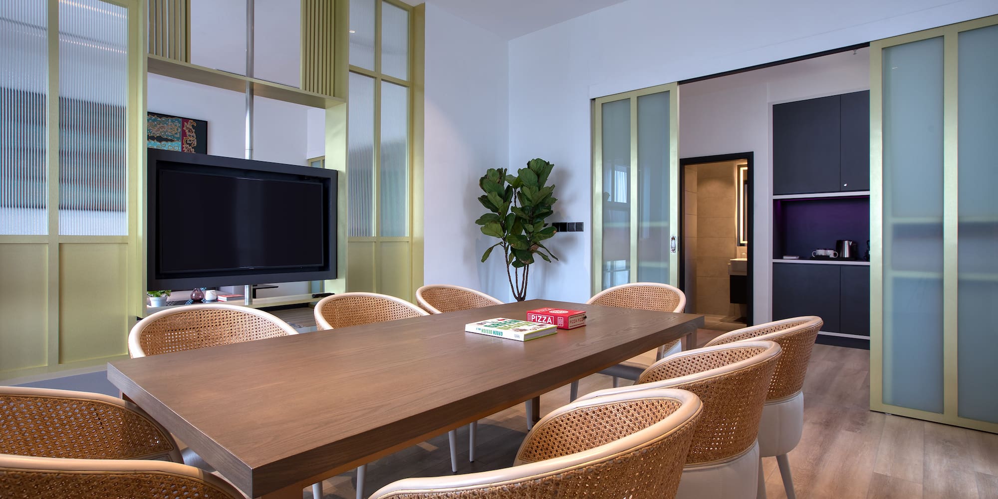 a room with a table and chairs