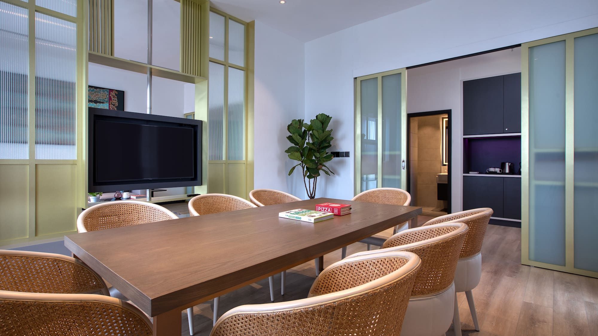 a room with a table and chairs