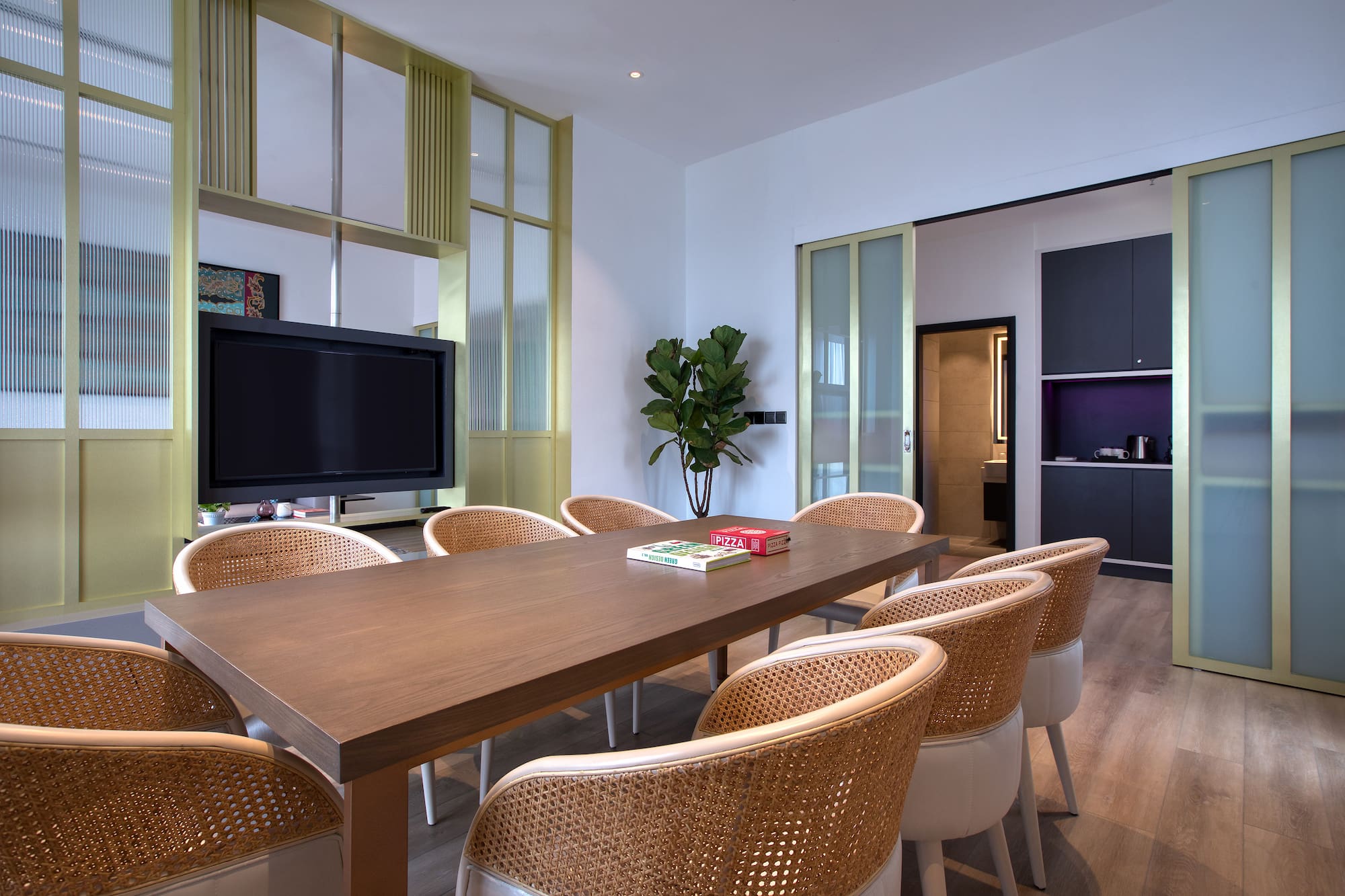 a room with a table and chairs