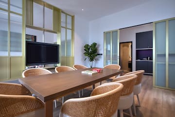 a room with a table and chairs