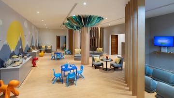 a room with a table and chairs