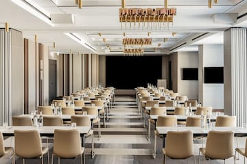 a room with tables and chairs