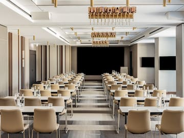 a room with tables and chairs