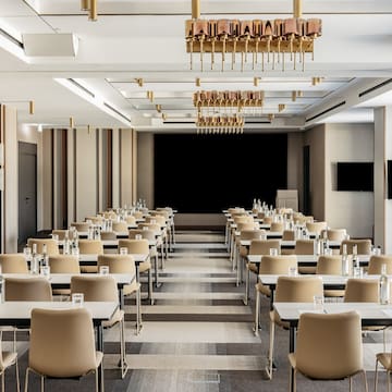 a room with tables and chairs