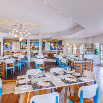 a room with tables and chairs