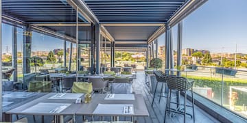 a restaurant with tables and chairs