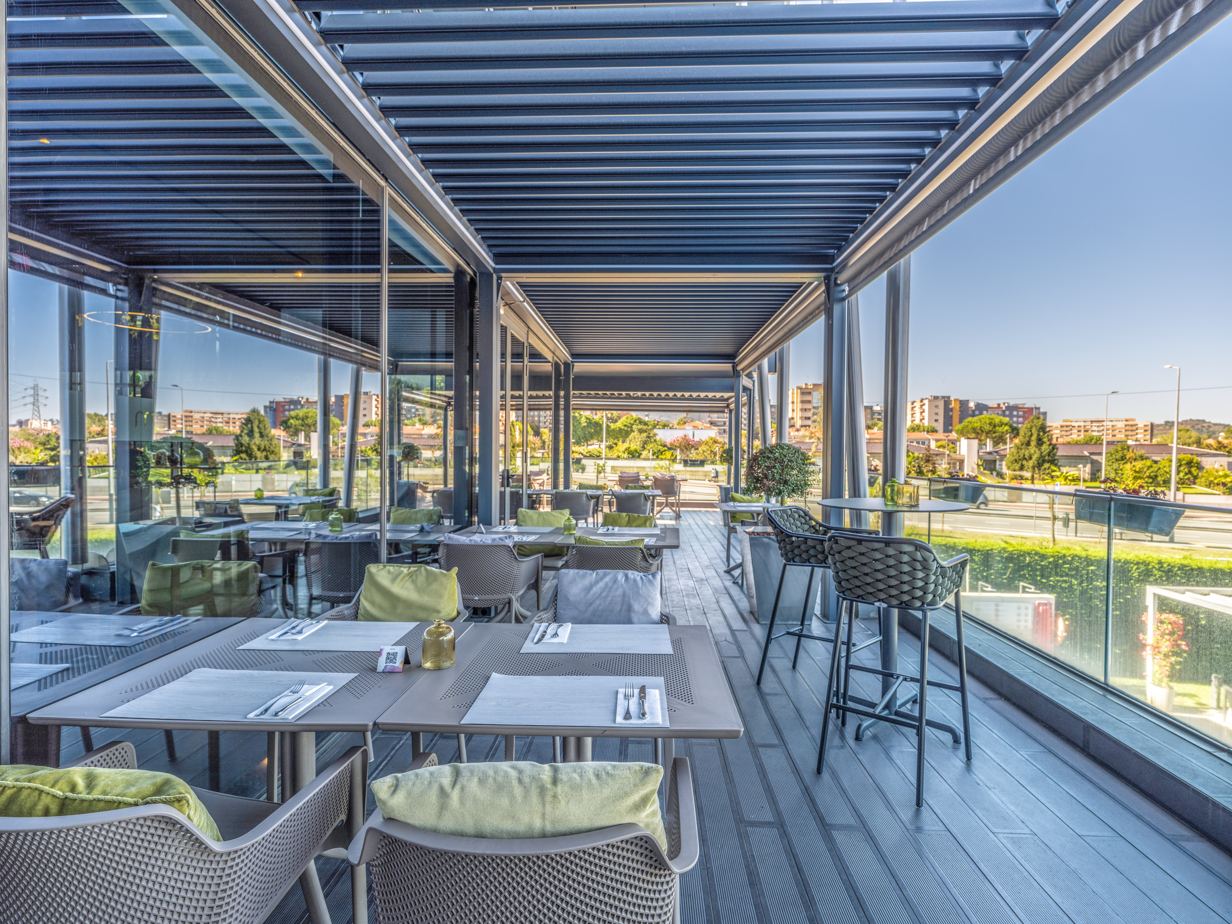 a restaurant with tables and chairs