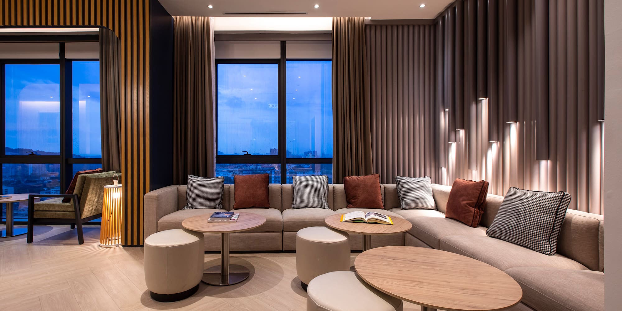 a room with a couch and tables