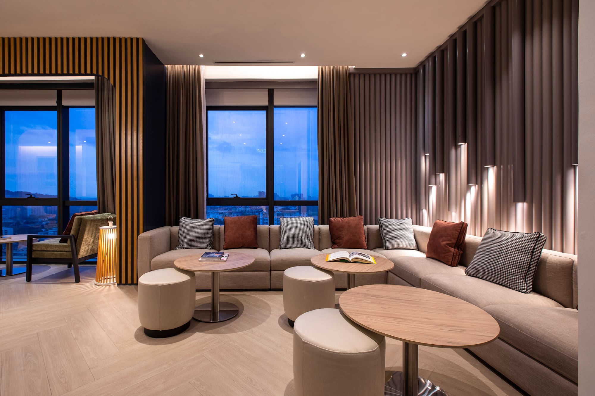 a room with a couch and tables