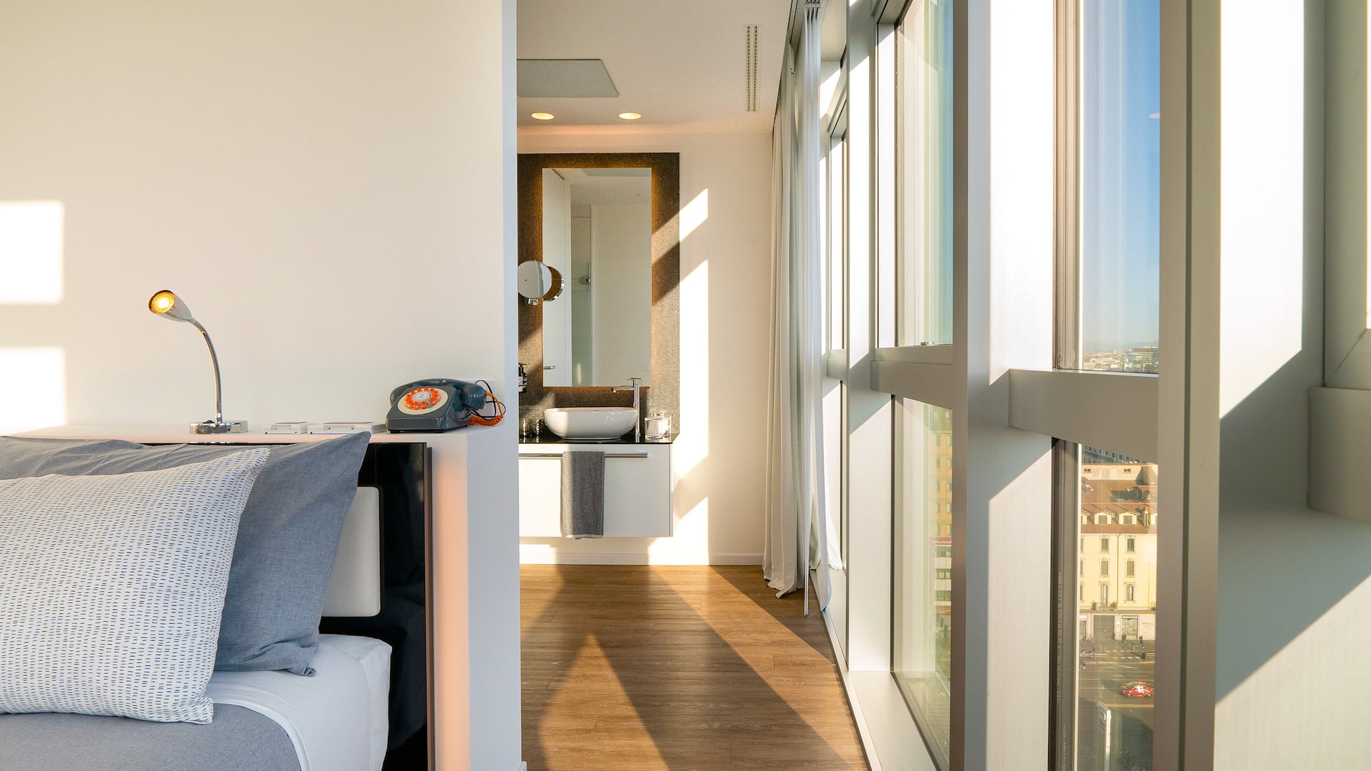 a room with a window and a wood floor