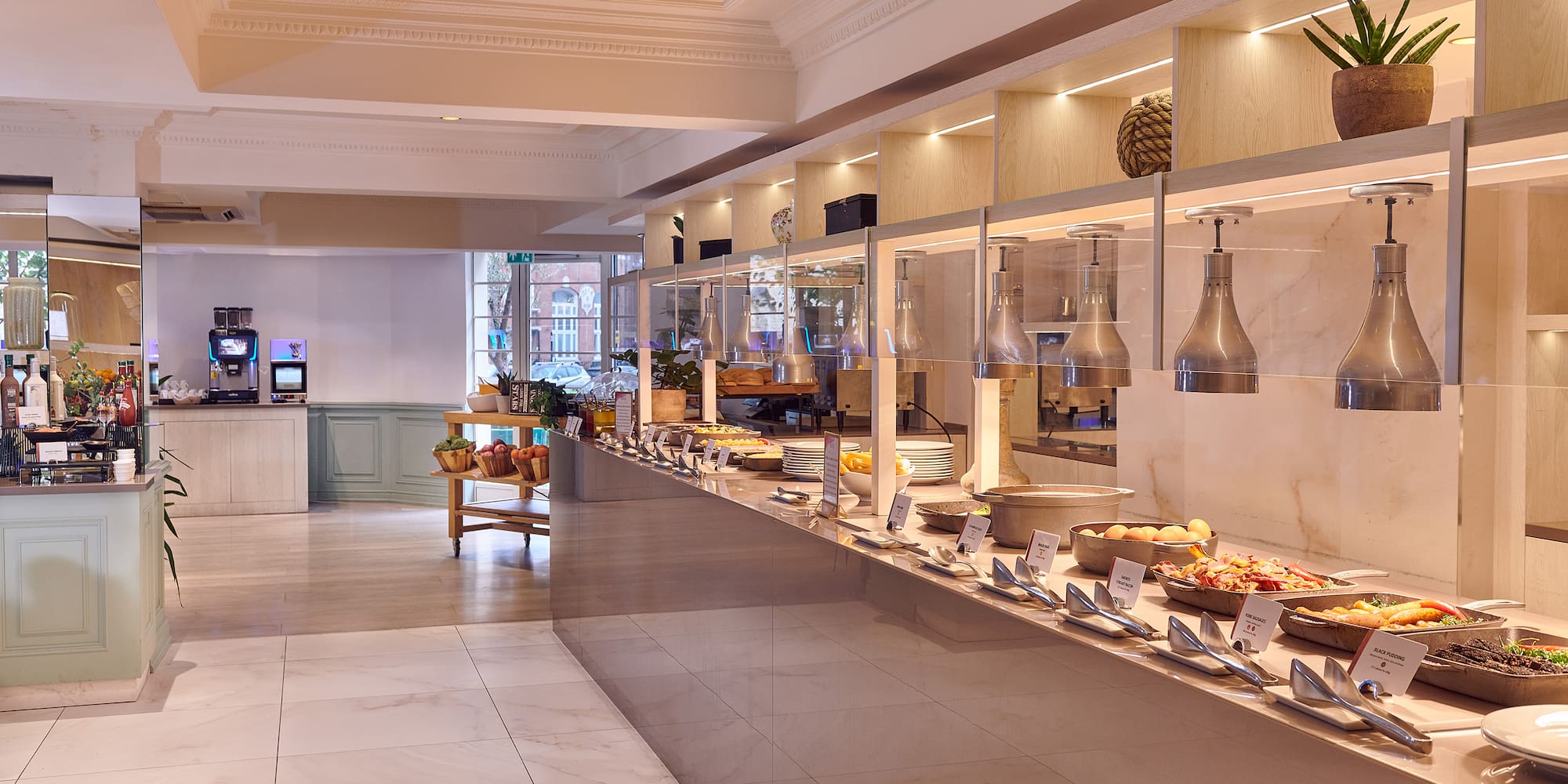 a buffet line with food on shelves