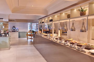 a buffet line with food on shelves