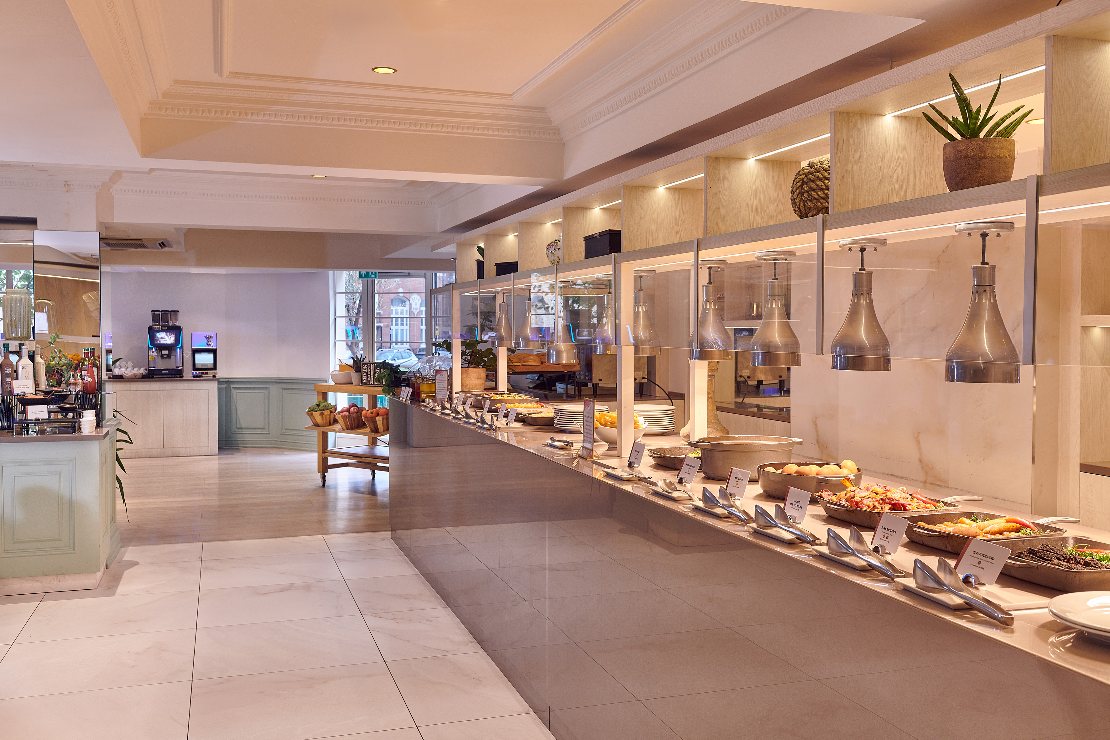 a buffet line with food on shelves