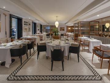 a room with tables and chairs