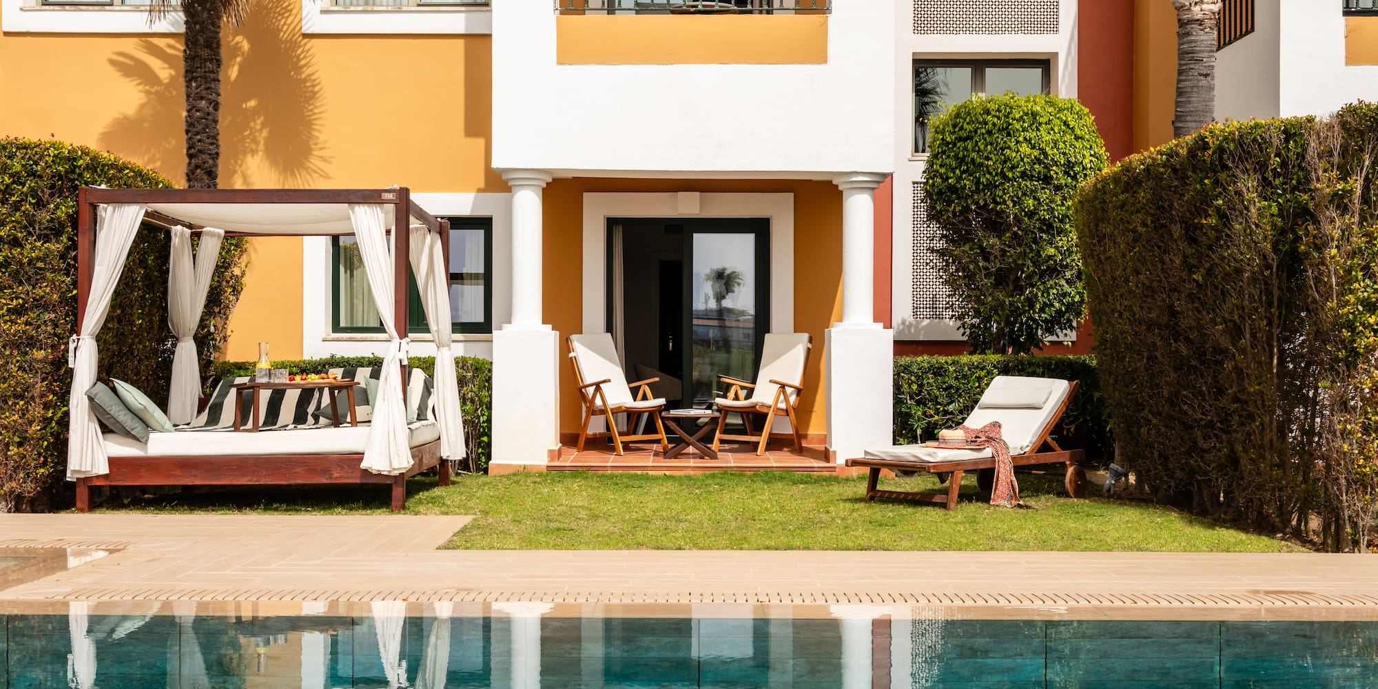 a pool in front of a building