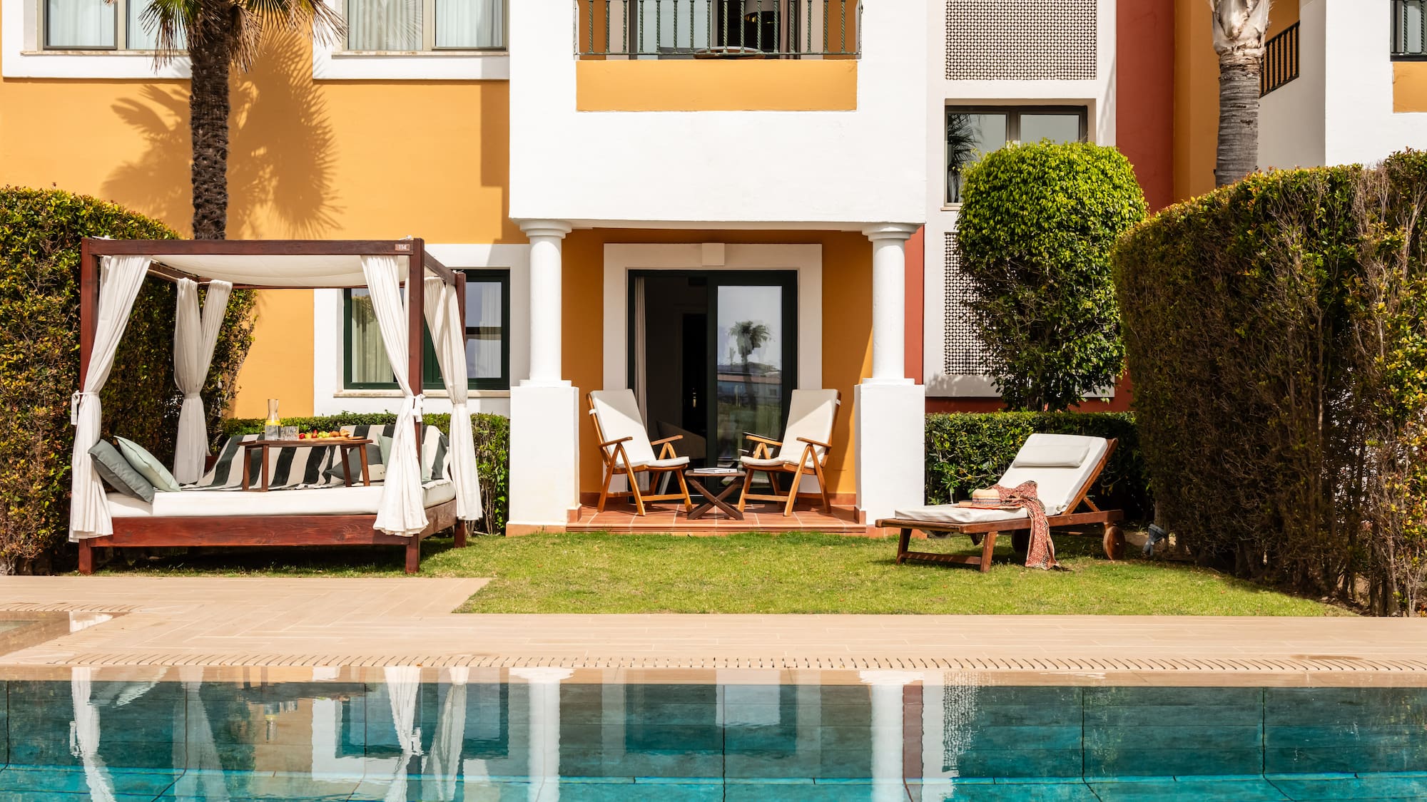 a pool in front of a building