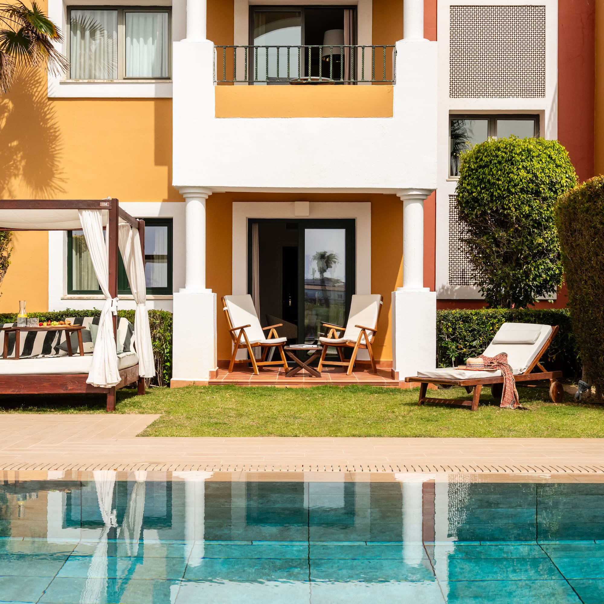 a pool in front of a building