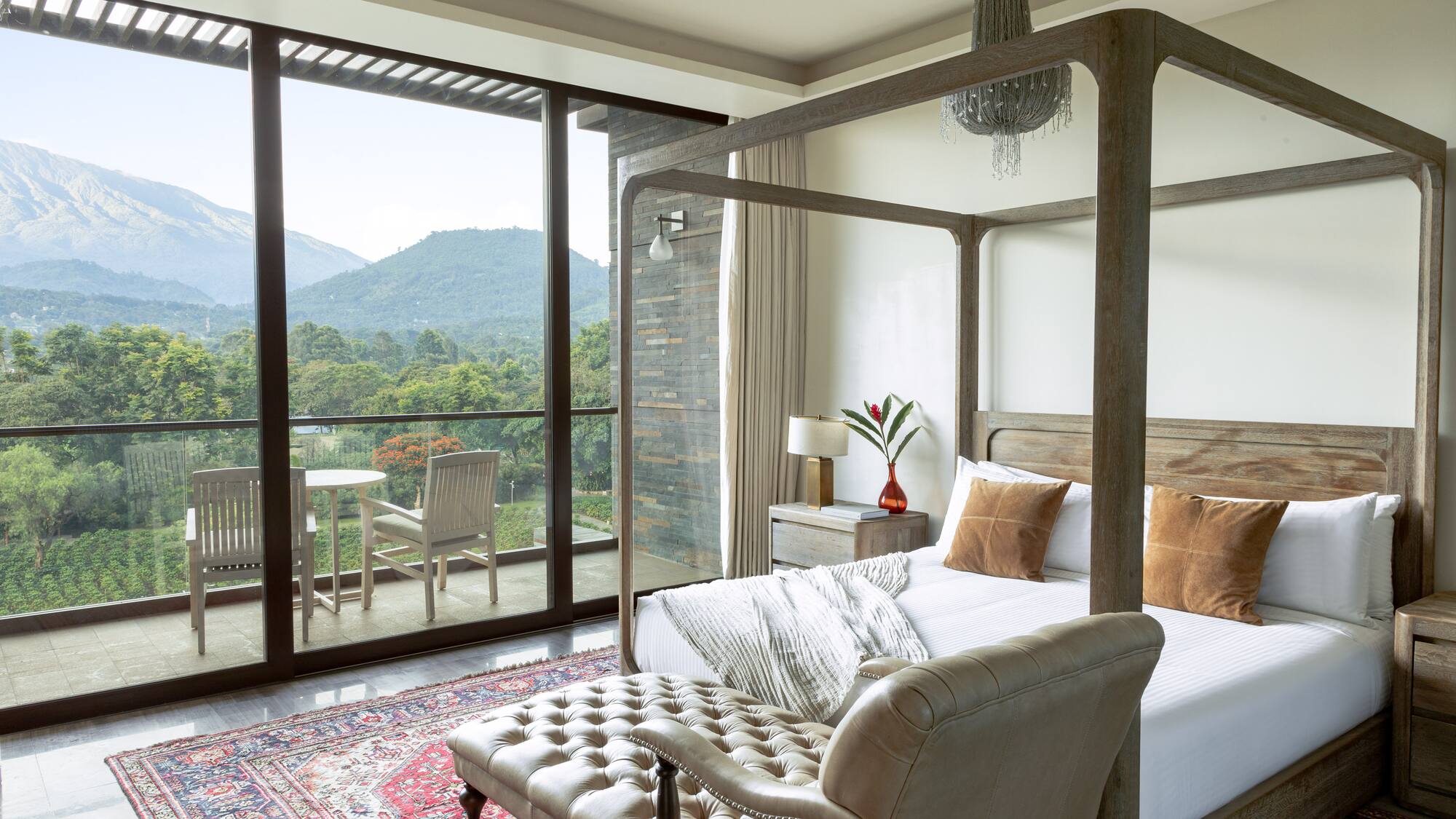 a bedroom with a bed and a chair