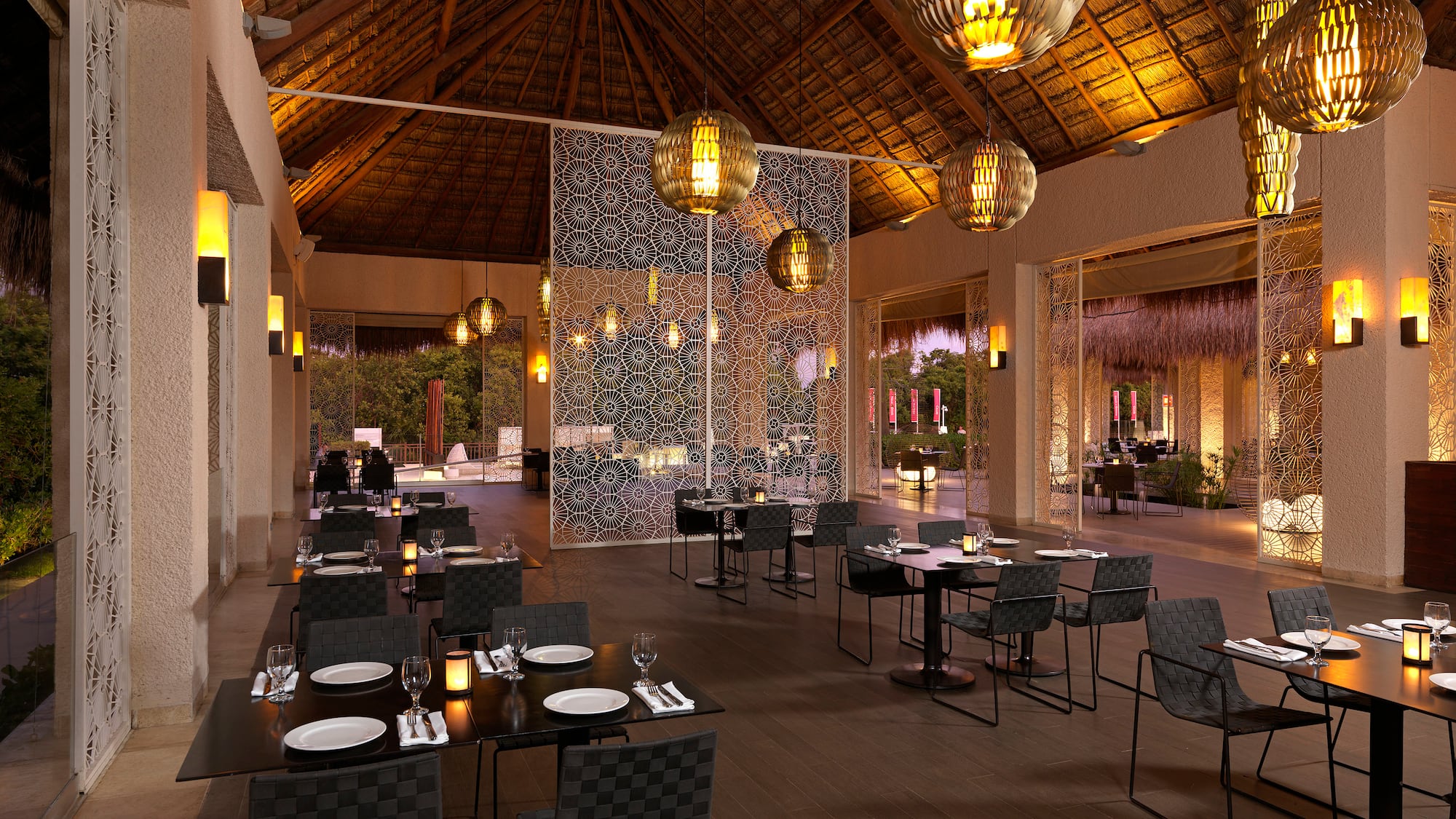 a restaurant with tables and chairs