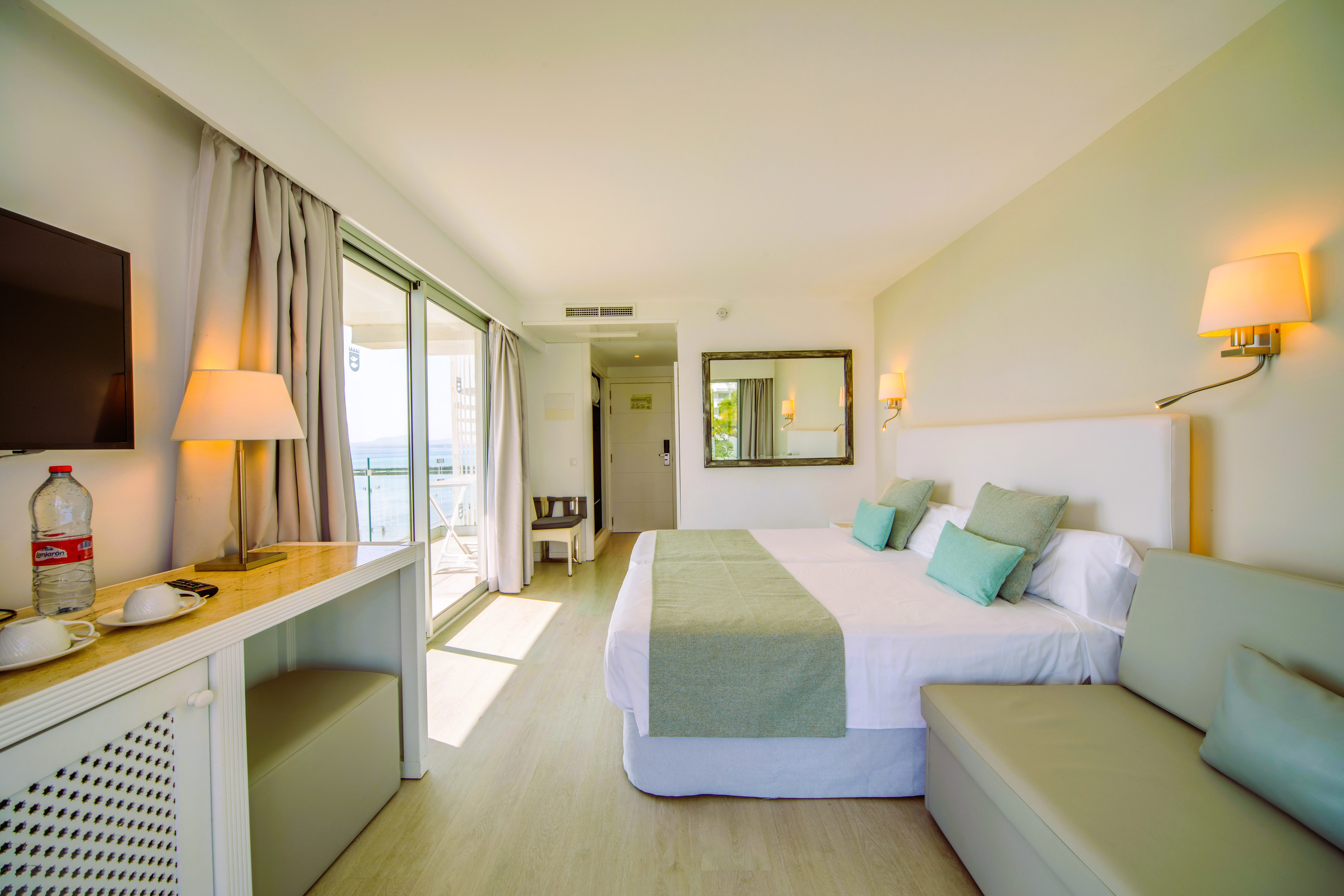 a room with a bed and a table