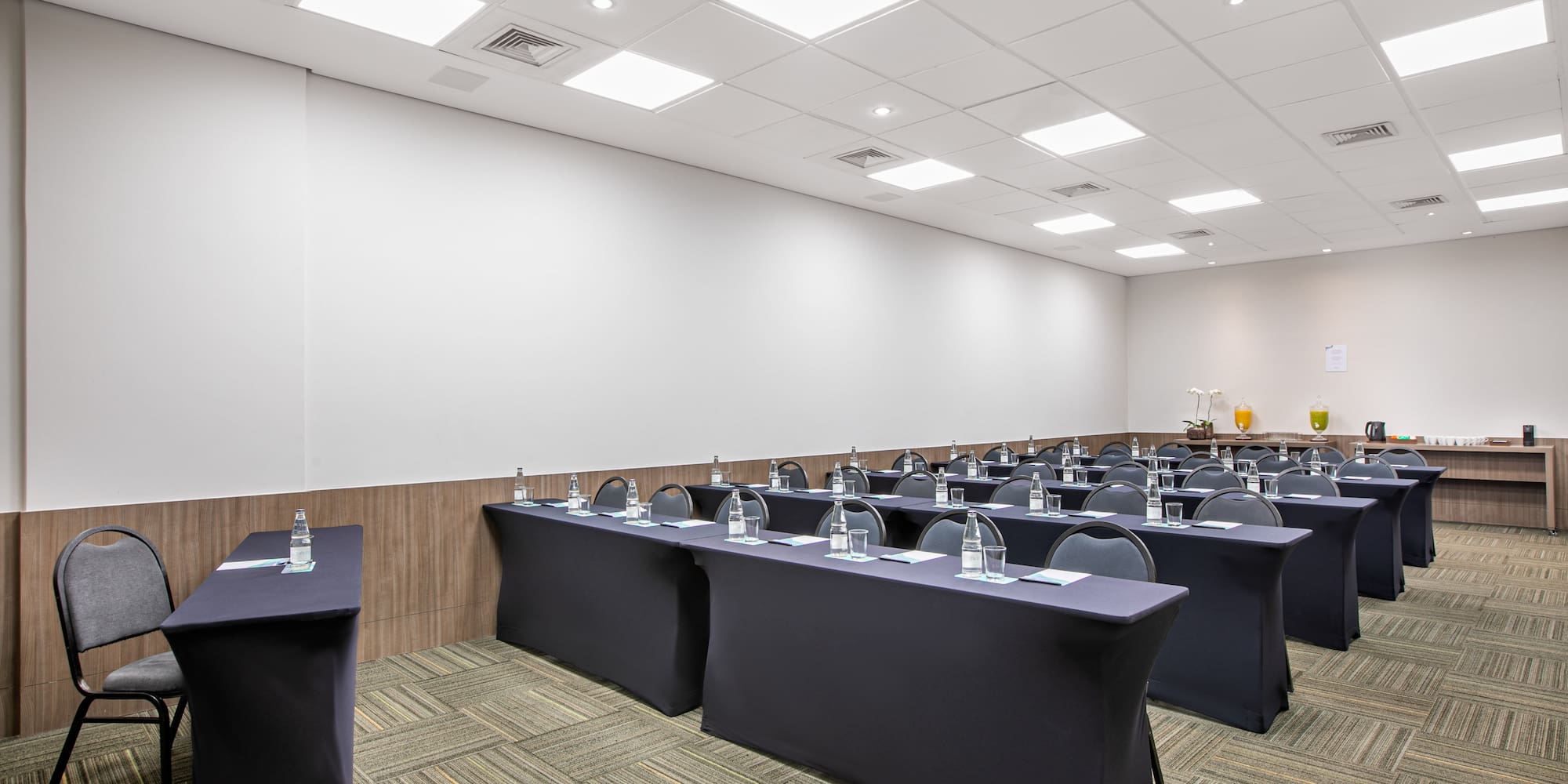 a room with tables and chairs