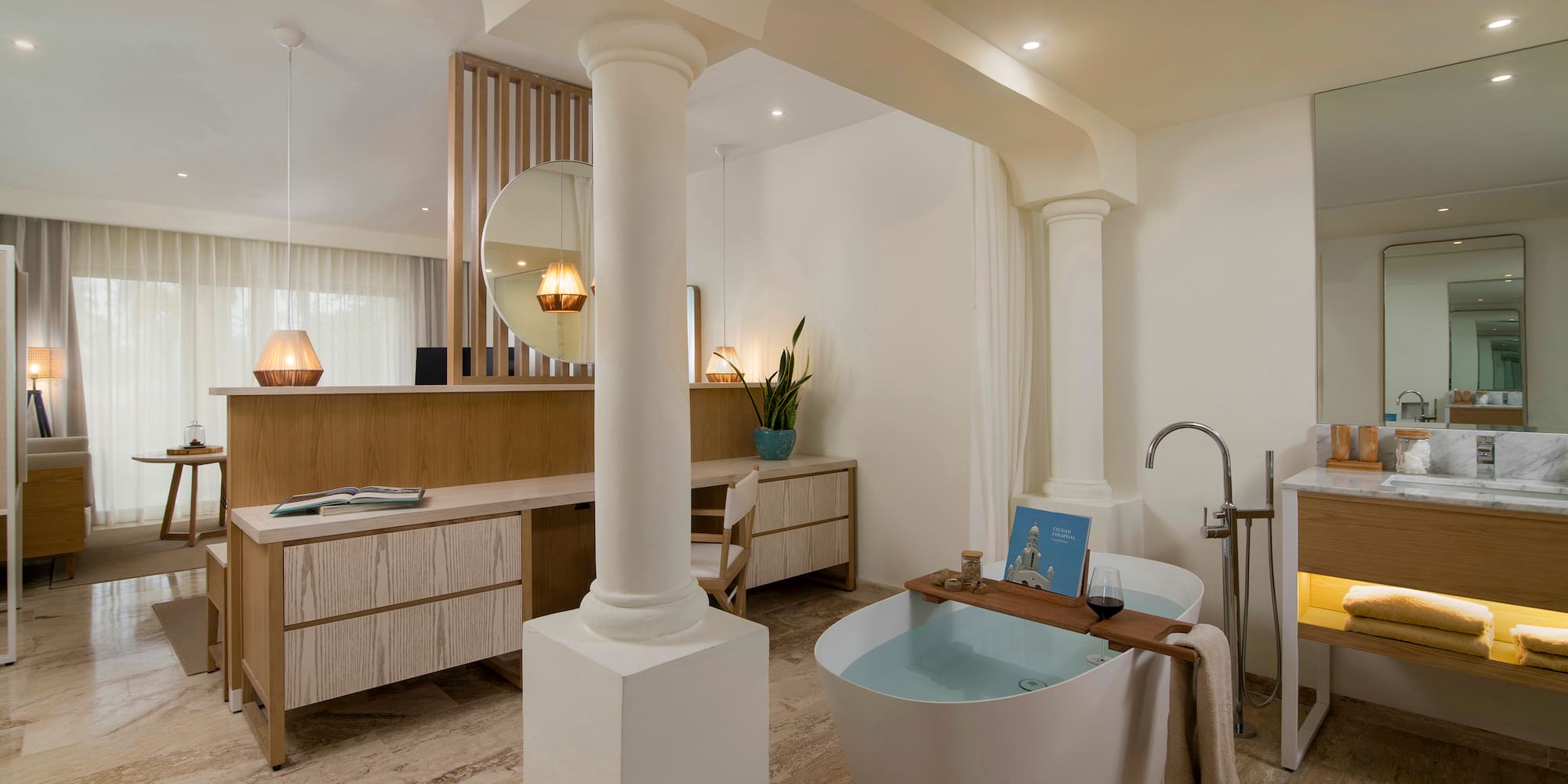 a bathroom with a tub and a sink