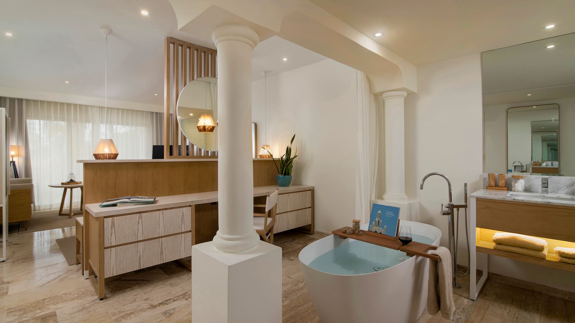 a bathroom with a tub and a sink