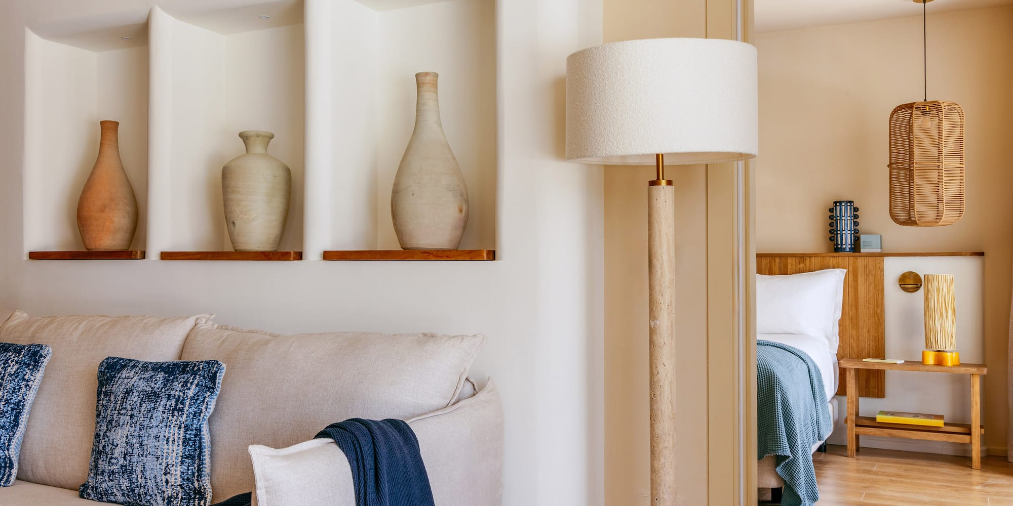 a lamp next to a couch