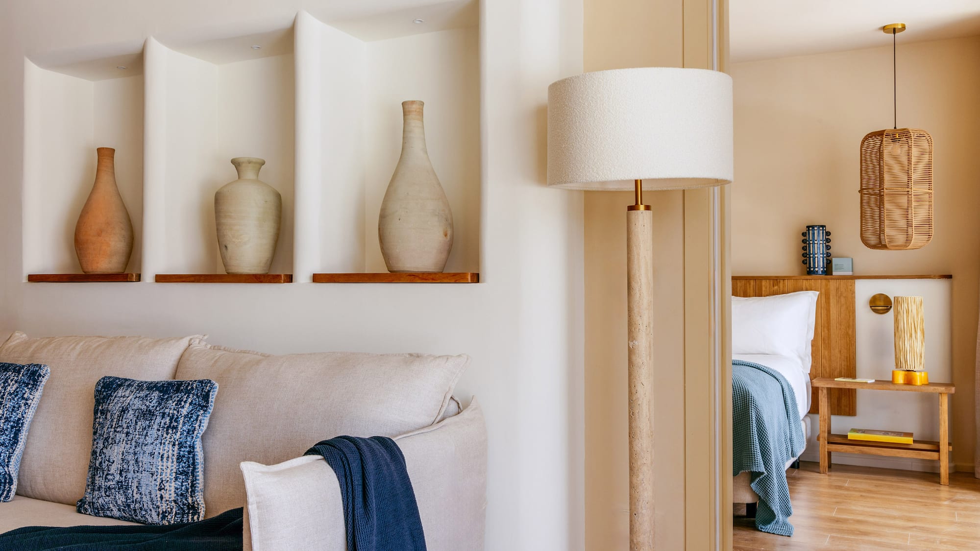 a lamp next to a couch