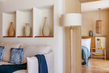 a lamp next to a couch