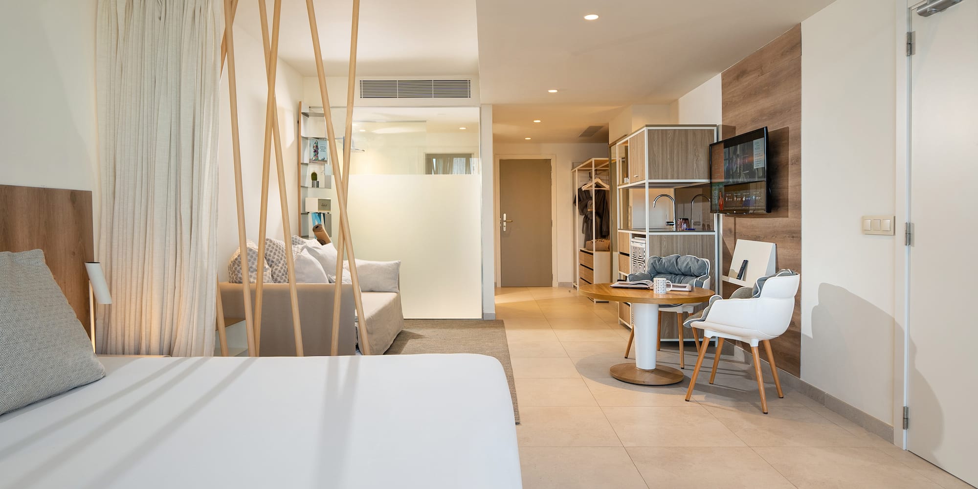 a room with a bed and a desk