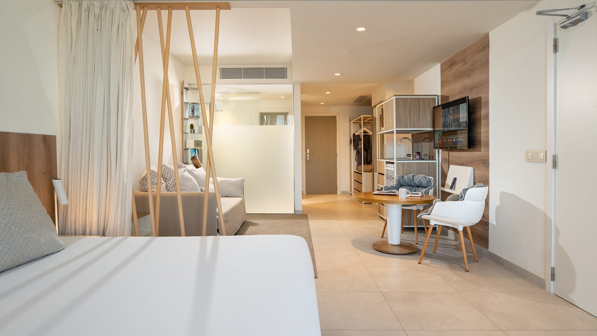 a room with a bed and a desk