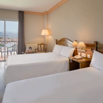 two beds in a hotel room