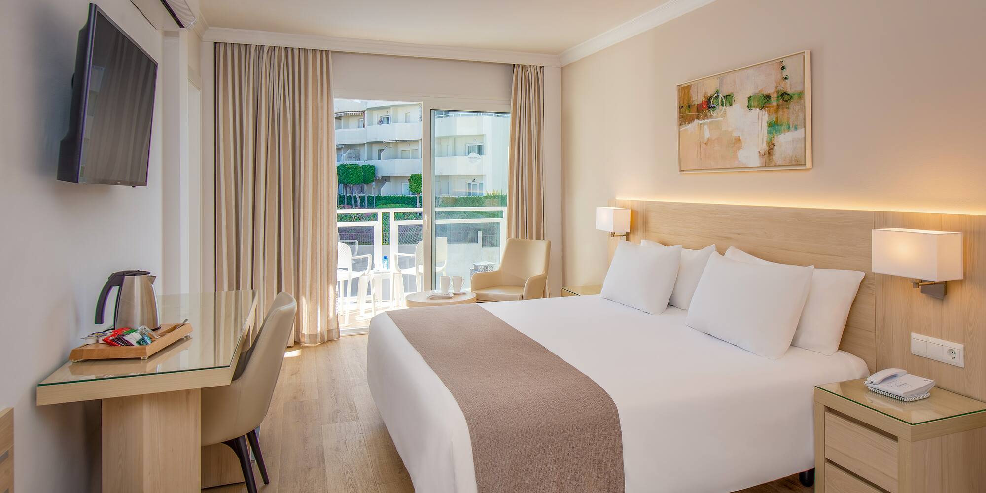 a room with a bed and a desk